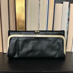 HOBO - Elegant Black Leather Kisslock Trifold Wallet with attached Mirror.